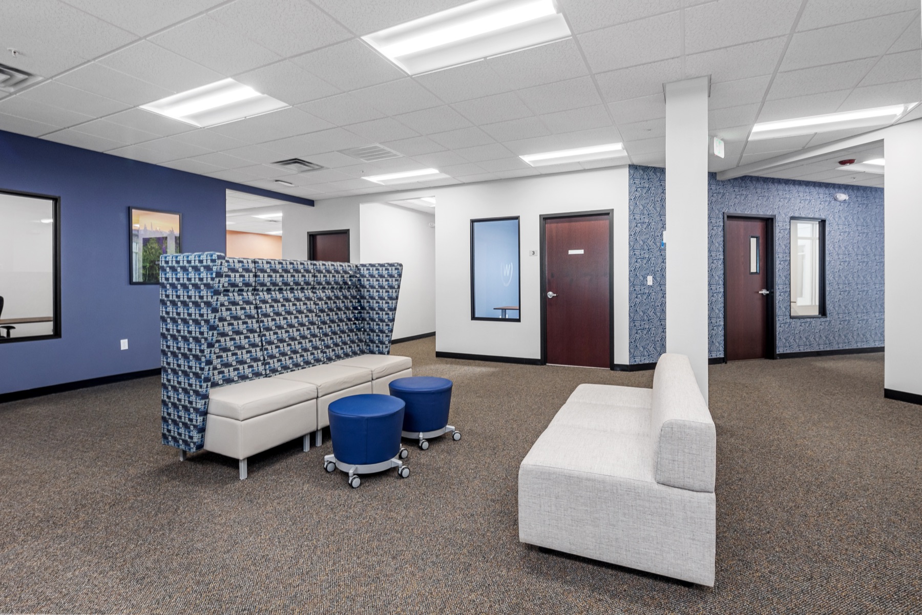 The member lounge at Workspace Beverly with booth and couch seating
