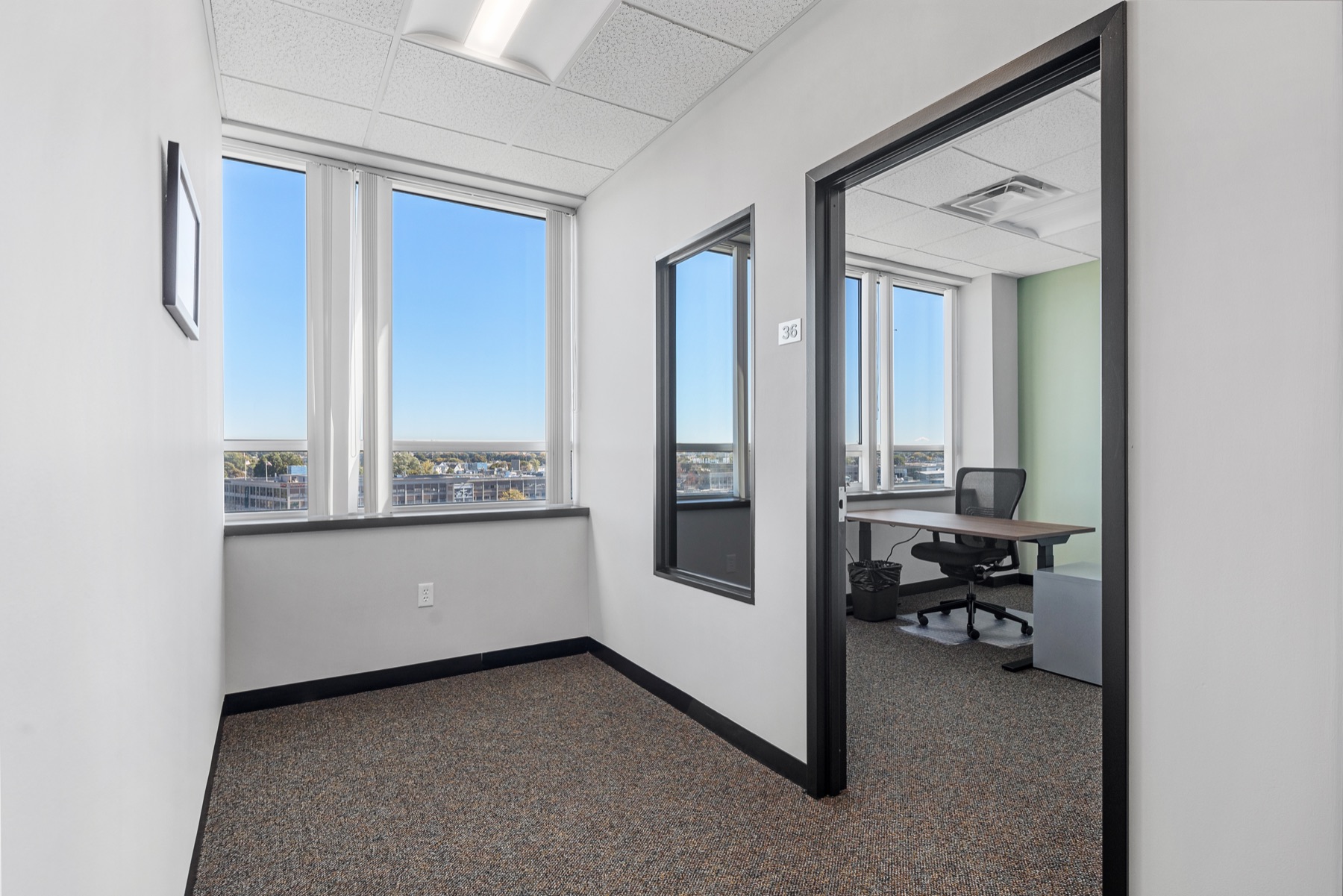 A corner office suite at Workspace Beverly with skyline views