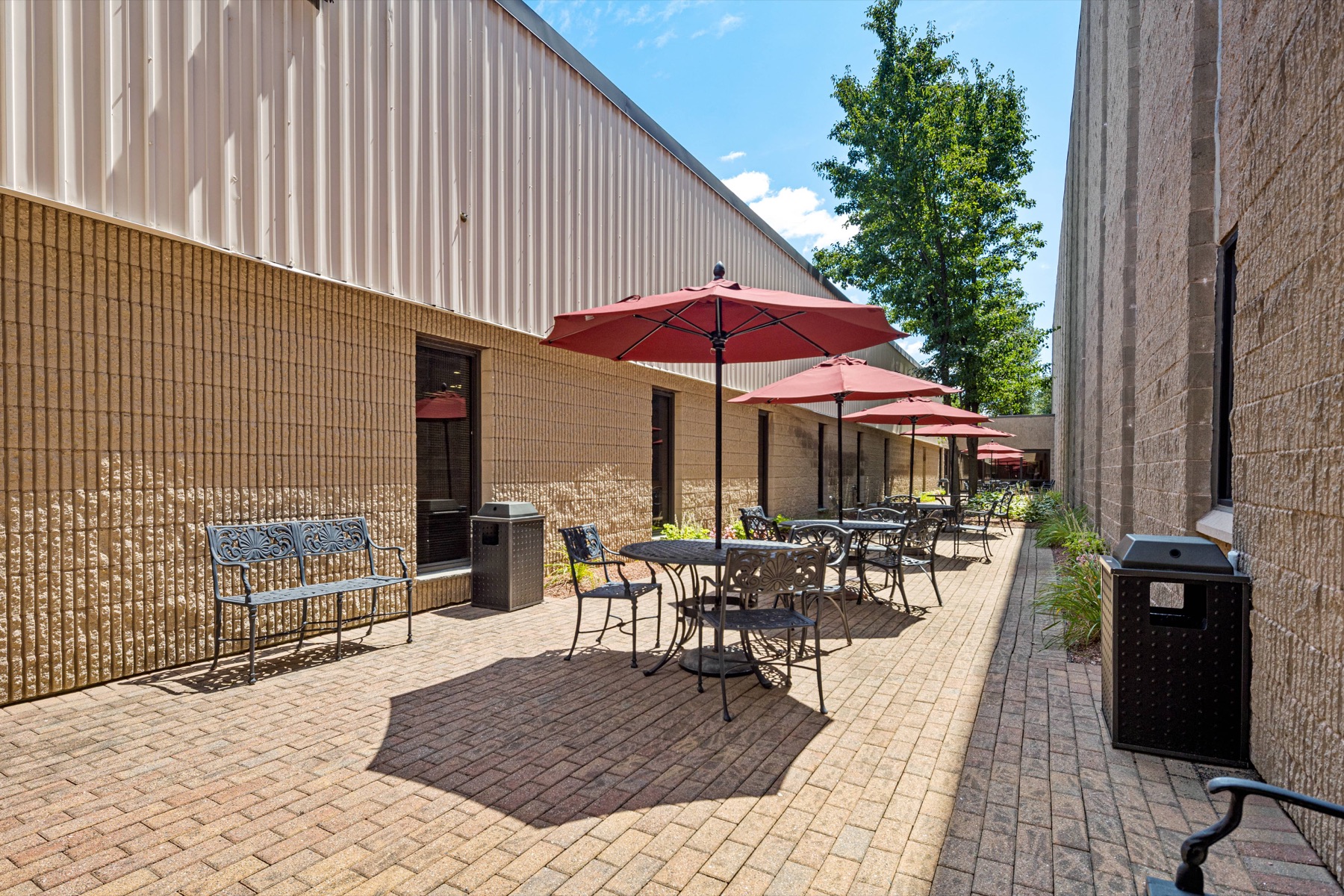 The outdoor patio at Workspace Canton with umbrella seating